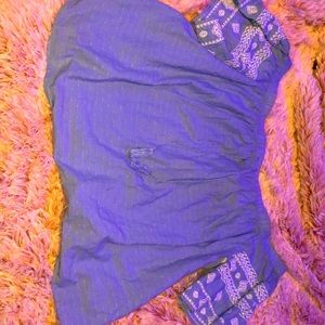 Off the shoulder flowing light blue shirt